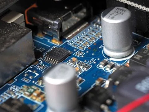 Low-angle close-up of the video card chip showing the Board and capacitors Stock Photos