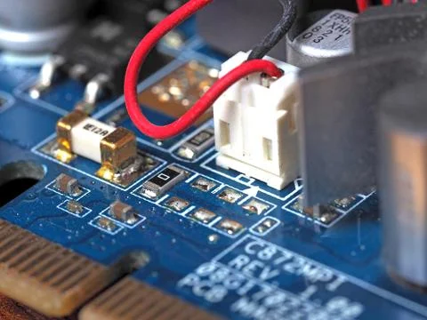 Low-angle close-up of the video card chip showing the Board and capacitors Stock Photos