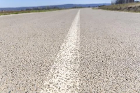A low-angle close-up view of an empty road Foto stock