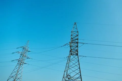 Low angle close up view of a strategic electrical distribution framework grid 스톡 사진