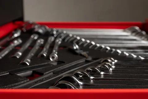 Low angle close-up of wrenches inside red tool drawer Stock Photos