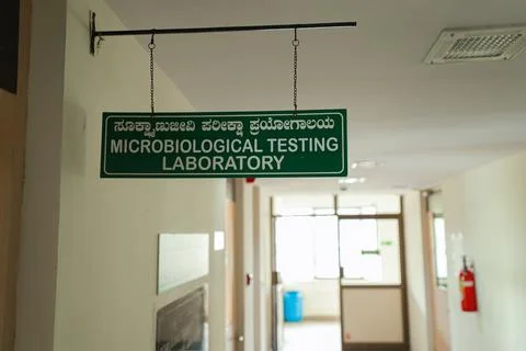 Low-angle closeup of microbiological testing laboratory green board and interior 스톡 사진
