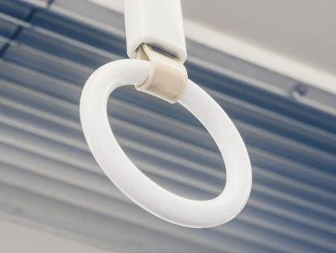 Low angle closeup shot of a round white bus handle Photos