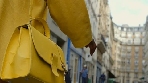 Low angle closeup view of a African woman out shopping in downtown Paris Stock Footage 120555069