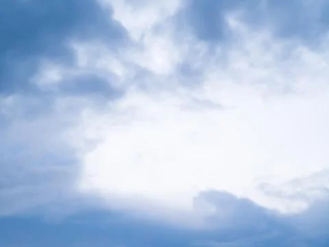 Low Angle. Clouds are forming, before the rain , center of white area. Stock Photos
