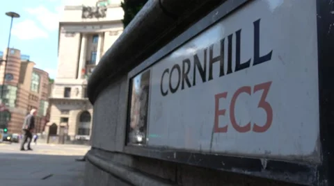 Low angle cornhill ec3 street sign, city of london with people waliking by Stock Footage 67010522