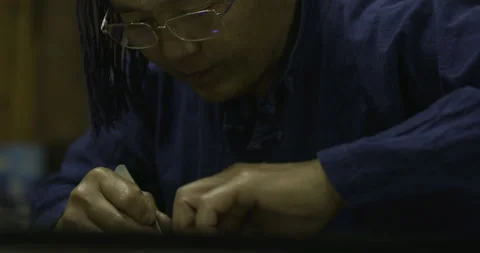 Low angle craftwork looking at face Stockbeeldmateriaal 141356994