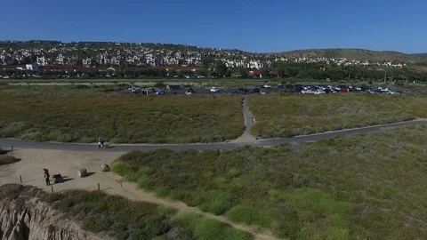 Low Angle of Crystal Cove Beach, Newport Beach Neighborhood Orange County CA Video stock 91613480