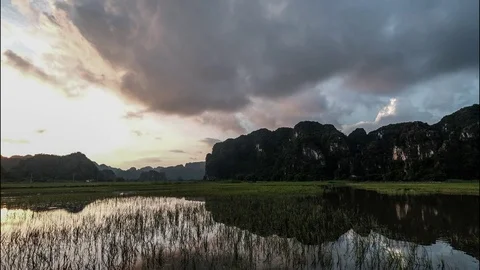 Low angle day to night time lapse in Tam Coc, Vietnam. Spectacular Stock Footage 116294592