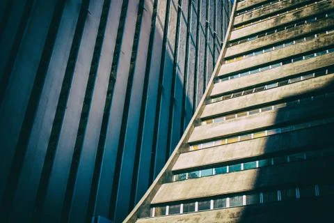 Low angle detail view of rounded corporate concrete building Fotos de archivo