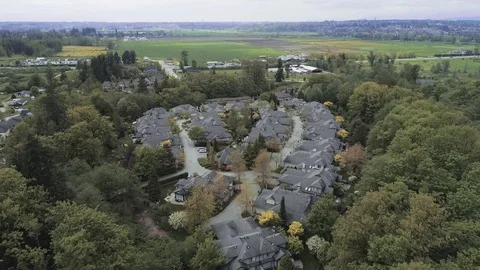 A Low Angle Dolly Shot of A Gated Suburban Community Stock Footage 89848801