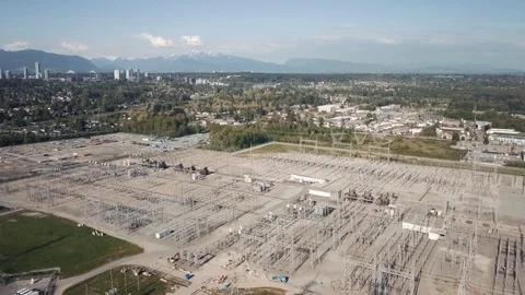 Low Angle Dolly Shot of a Large Power Substation Stock Footage 89874999