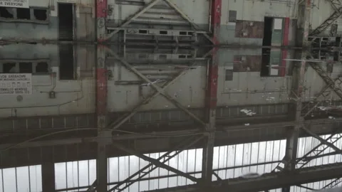 Low Angle dolly shot water drops in abandoned building Stock Footage 252293956