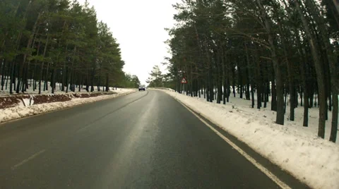 Low angle driving POV on snowy country road in Spain - Hyperlapse Time lapse Stock Footage 36001826