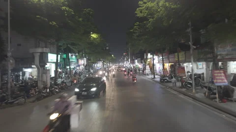 Low angle drone dolly forward street Hanoi at night Vidéo 286770141