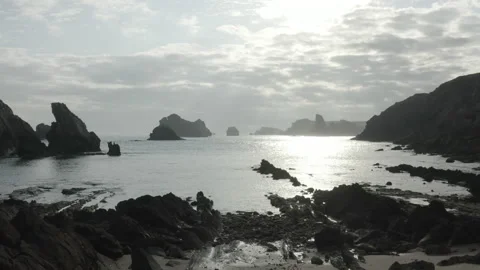 Low angle drone shot of beautiful reef and rocks under the sun light in Spain Stock Footage 137706837