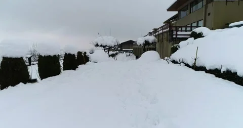 Low angle drone shot capturing snow on ground in srinagar. Stock Footage 310656534