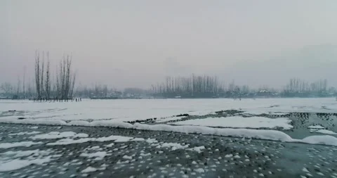 Low angle drone shot of snow in kashmir Stock Footage 310656336