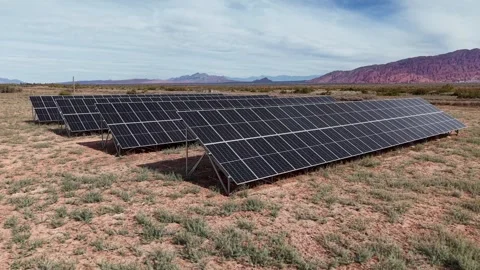 Low angle drone tracking shot of photovoltaic solar panels array in a remot.. Stock-Footage 336973572