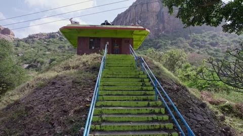 A low angle drone view of old temple steps leading toward sacred lord shiva.. Stock Footage 346712297