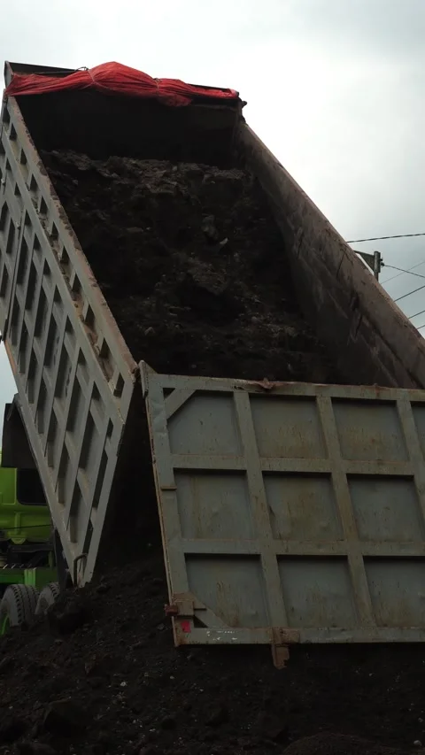 Low Angle Dump Truck Unloading Video stock 275146189
