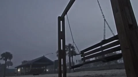 Low angle of empty swing moving on foggy beach Vídeos de archivo 45288902