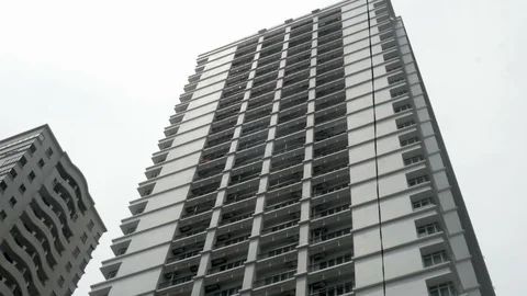 Low angle establishing shot of modern generic tall buildings Stock Footage 87785112