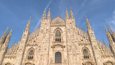 Low Angle Establishing View of Milan Duomo Cathedral Over City Skyline in Video stock 346600774