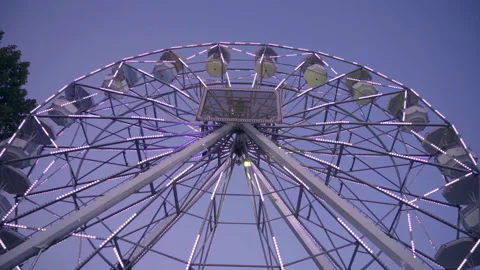 Low Angle Of Ferris Wheel In The Evening Stock Footage 235971592