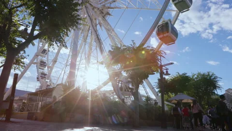 Low angle: Ferris wheel rotating, HD 50p Stock Footage 242013728