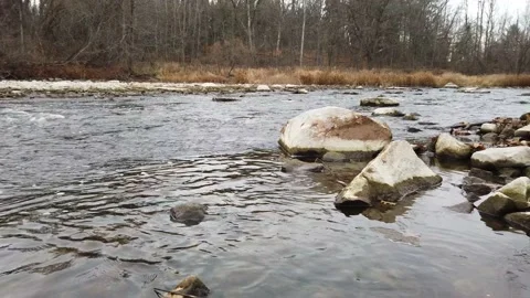 Low angle of a flowing river Stock Footage 144053060