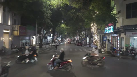 Low angle fly forward streets hanoi at night Stock Footage 286770006