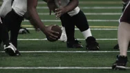 Low Angle Foot Shot Of Football Players Running A Play Stock Footage