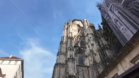 Low angle footage of the historic facade of St. Stephen's Cathedral in Vienna Stock Footage 343230188