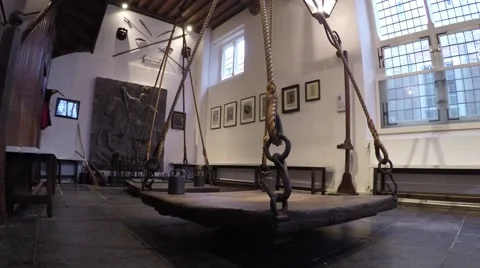 Low angle footage of large medieval weighing scale camera pan right to left 4k Stock Footage 59535367