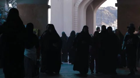 Low Angle Footage of people walking in souk mutrah aisle Stock Footage 45842396