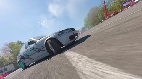 Low-Angle FPV Drift Run With Close Proximity Shots Stock Footage 328472429