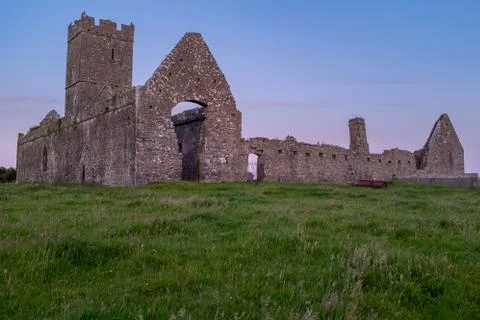 A low angle front view of the ruins of Clare Abbey a Augustinian monastery ju Stock Photos