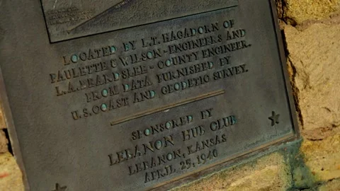 Low angle of the geographic center plaque's inscription Stock-Footage 345530832