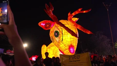 Low Angle Gimbal Pan Giant Illuminated Deer Puppet Crowd Siem Reap Stock Footage 348480288