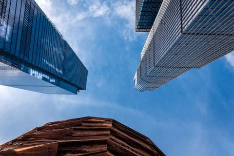 Low angle graphic view of skyscrapers and the Vessel building parts, sunny bl Fotos de archivo