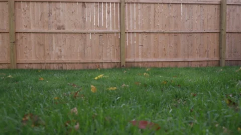 Low Angle Grass New Fence Move Left and Right Stock Footage 68778026
