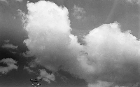 Low angle grey scale shot of the beautiful clouds in the sky Stock Photos