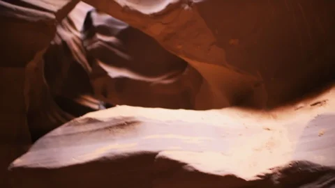 Low angle handheld panning view Antelope slot canyon in Page, Arizona Stock Footage 120606121