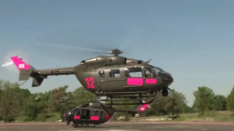 Low Angle of a Helicopter Taking off From a Runway Stock Footage 130587917