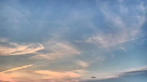 Low angle, high contrast shot of a landing airplane showing airflow. Stock Footage 61720784