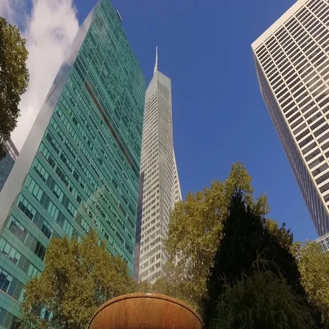 Low angle of high rise buildings with fountain in foreground  Stock Footage 69277898