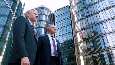 Low angle, hiring young motivated woman for a project, two businessmen Stock Footage 134600936
