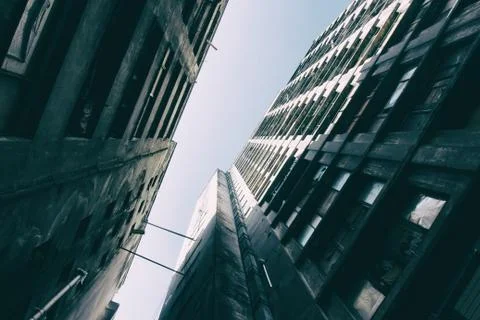 Low angle inside view from a complex of concrete aged buildings. Foto stock