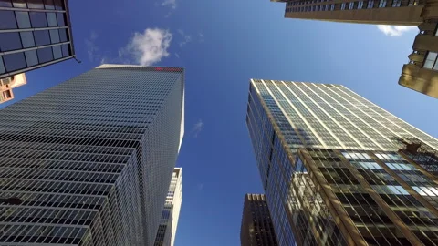 Low Angle Lockdown Shot Of Skyscrapers In Modern Capital City Against Sky - New Stock Footage 243166616